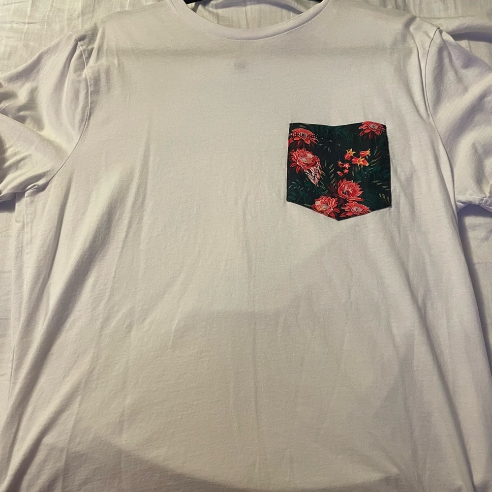 White “Divided Brand” tee with a flower patch. Size Large. Only worn once